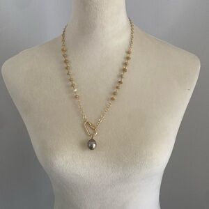 Unique gold toned beaded necklace